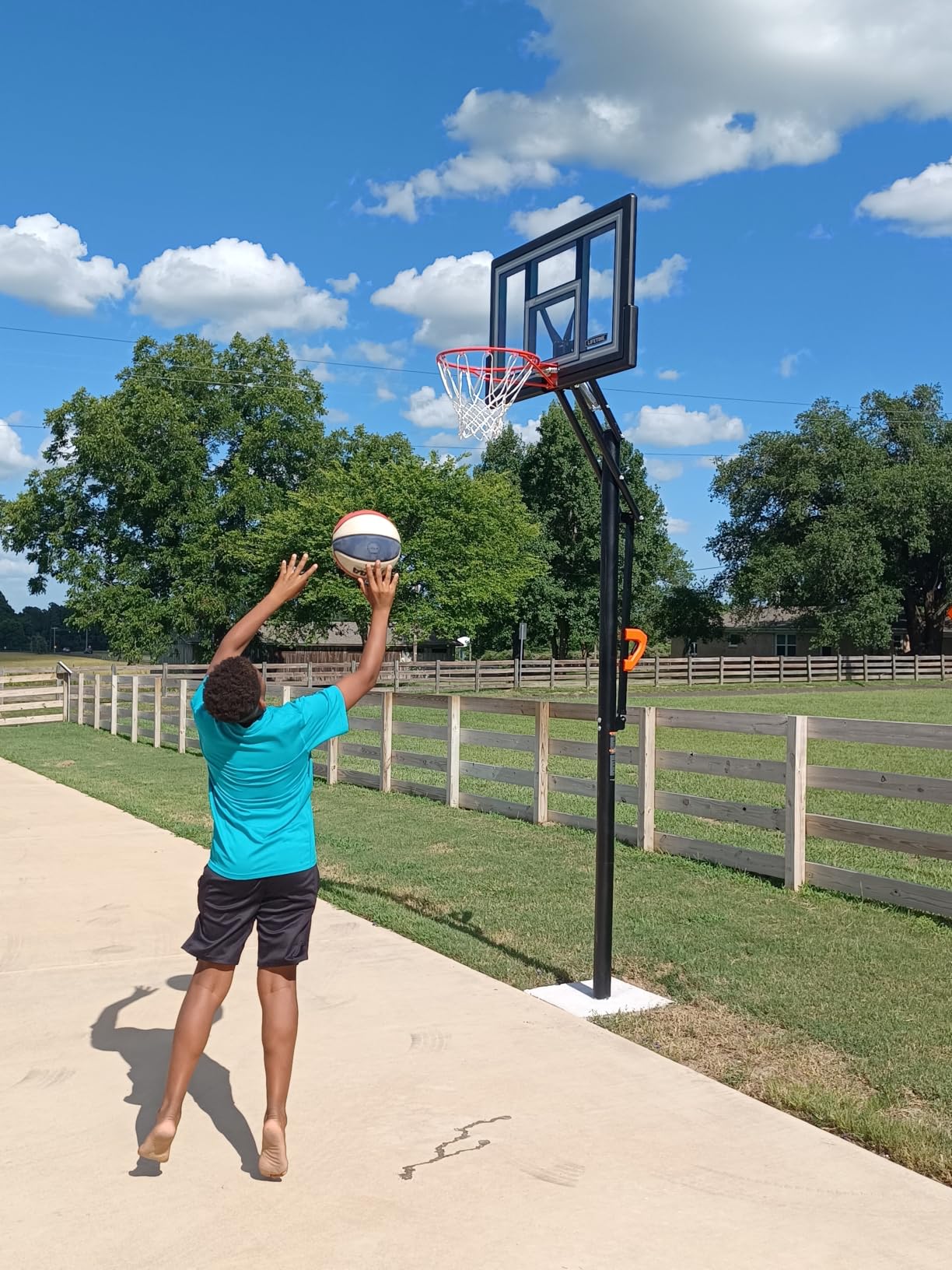 Lifetime 1084 Height Adjustable In Ground Basketball System, 50 Inch Shatterproof Backboard customer photo 1