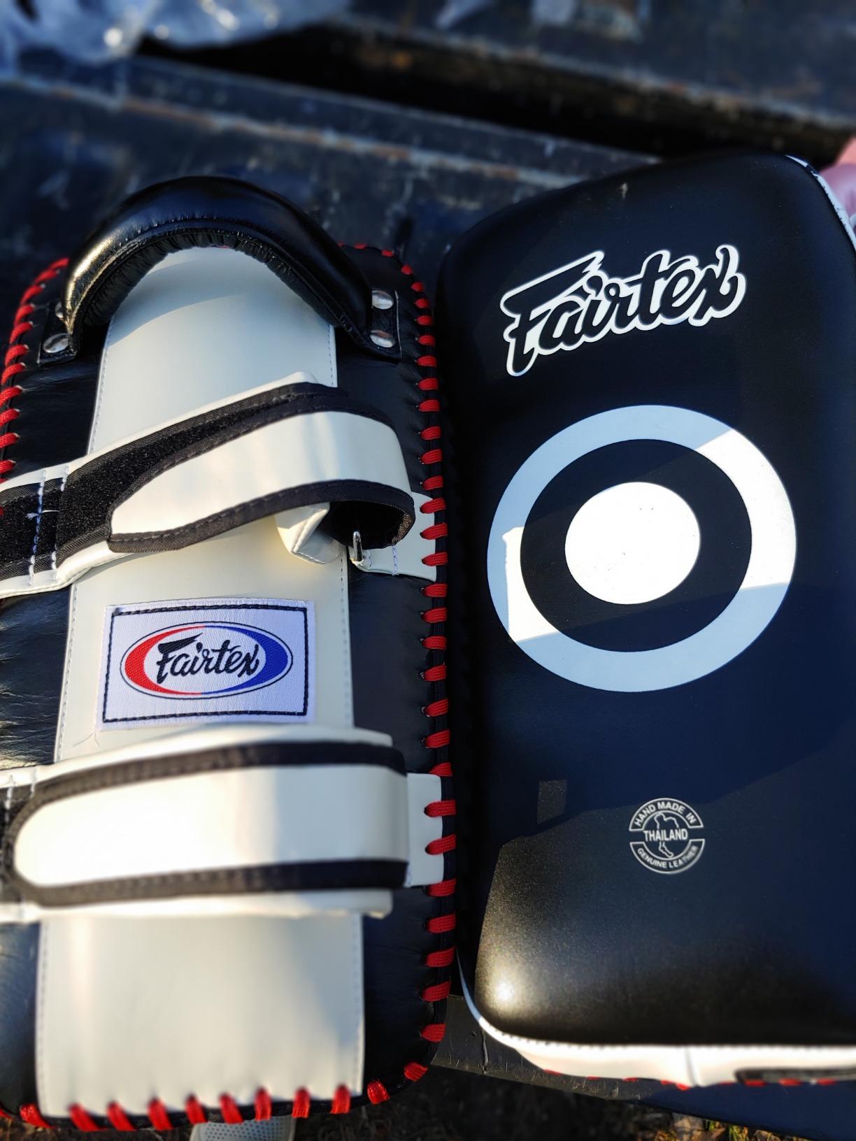 Fairtex Curved Muay Thai Pads, Kickboxing Punching Kicking Striking Shield | Handcrafted cowhide leather with thick foam. Dual forearm support straps assist trainer holding during self-defense drills. customer photo 1