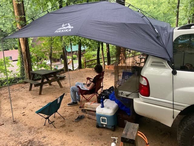 Hasika Waterproof SUV Tailgate Tent and Car Awning | Universal fit for SUVs Vans RV Trailer. Features heavy-duty suction cups, adjustable poles, and 76 sq ft of waterproof shade customer photo 2