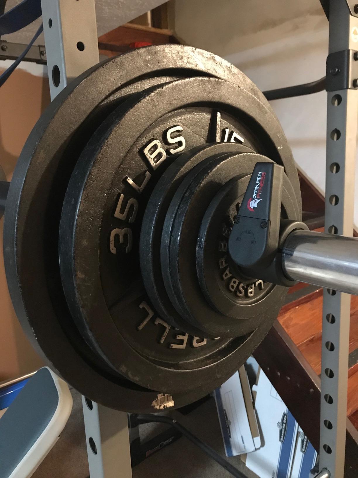 Dark Iron Fitness Barbell Clamps 2 Inch - 1 Pair of Olympic Size Weight Barbell Collars, Professional Weightlifting Plate Clips with Quick Release Spring Lock customer photo 2