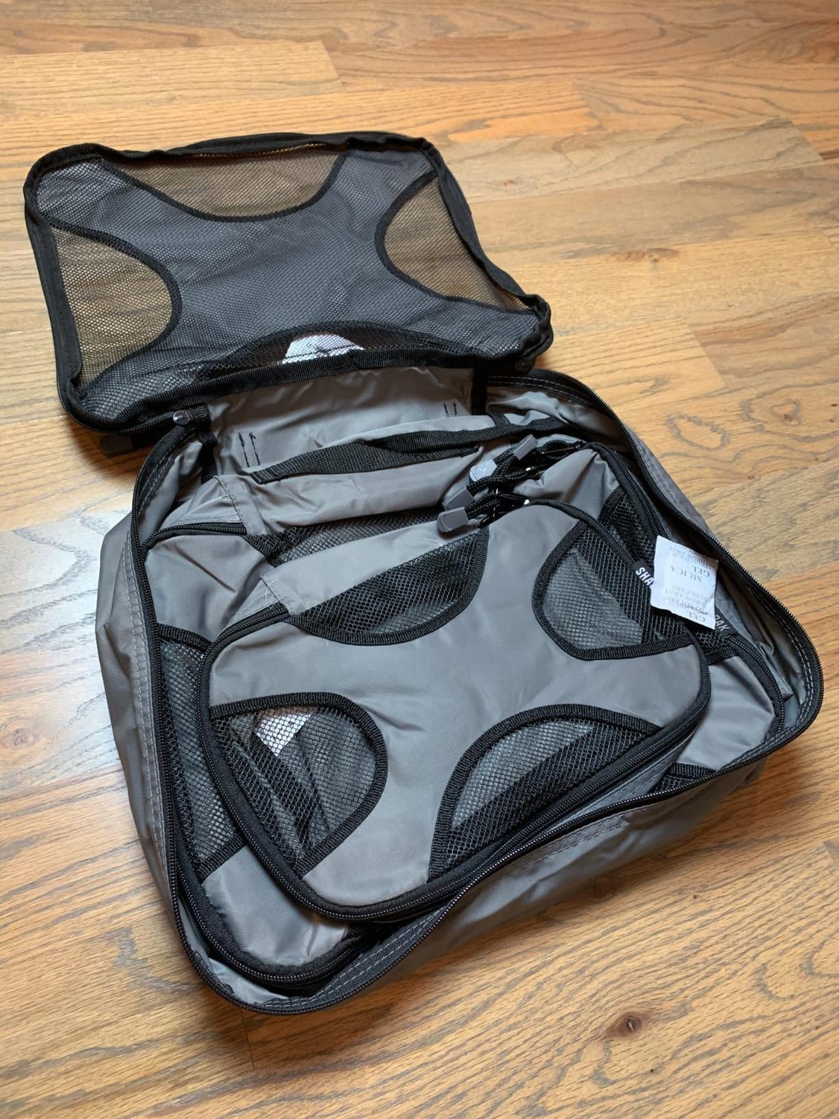 Shacke 5 Set Packing Cubes for Travel with Laundry Bag (Pure Black) - Suitcase Organizer Bags Set: 4 Water-Resistant Luggage Cubes, XL to Small, + Laundry Bag for Carry-On or Checked customer photo 2