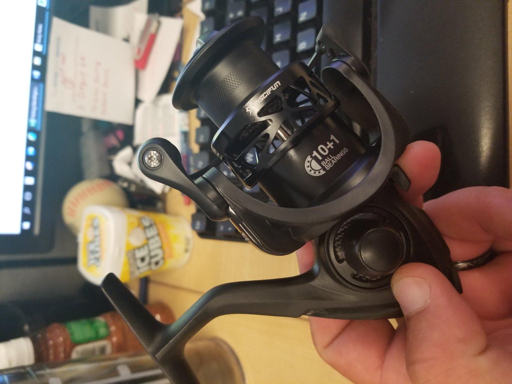 Piscifun Carbon X Ultralight Spinning Reel, Carbon Frame, 33lb Max Drag | 10+1 shielded bearings, smooth retrieve, two handle styles by size, balanced for freshwater bass and trout fishing, 500-4000 customer photo 2