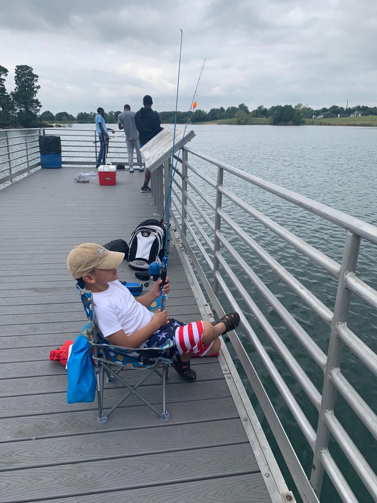 PLUSINNO Kids Fishing Pole with Spincast Reel Telescopic Fishing Rod Combo Full Kits for Boys, Girls, and Adults customer photo 1
