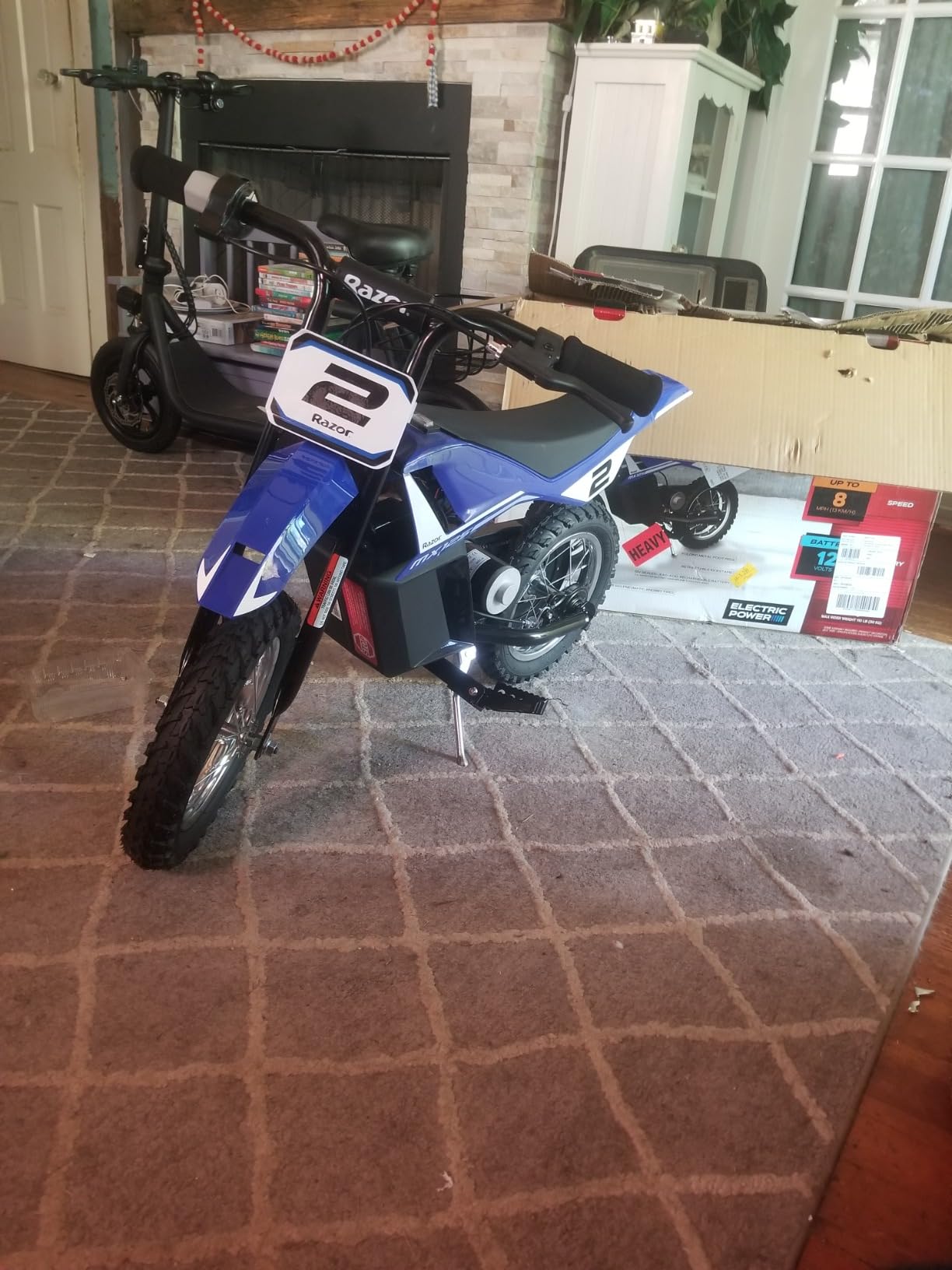 Razor MX125 Dirt Rocket Electric-Powered Bike, Rear-Wheel Drive, 100W High-Torque Chain-Driven Motor, for Kids 7+, Blue, 100W/12V Motor, Up to 8 MPH, 40 Mins Ride Time, 78 Lbs Capacity customer photo 1