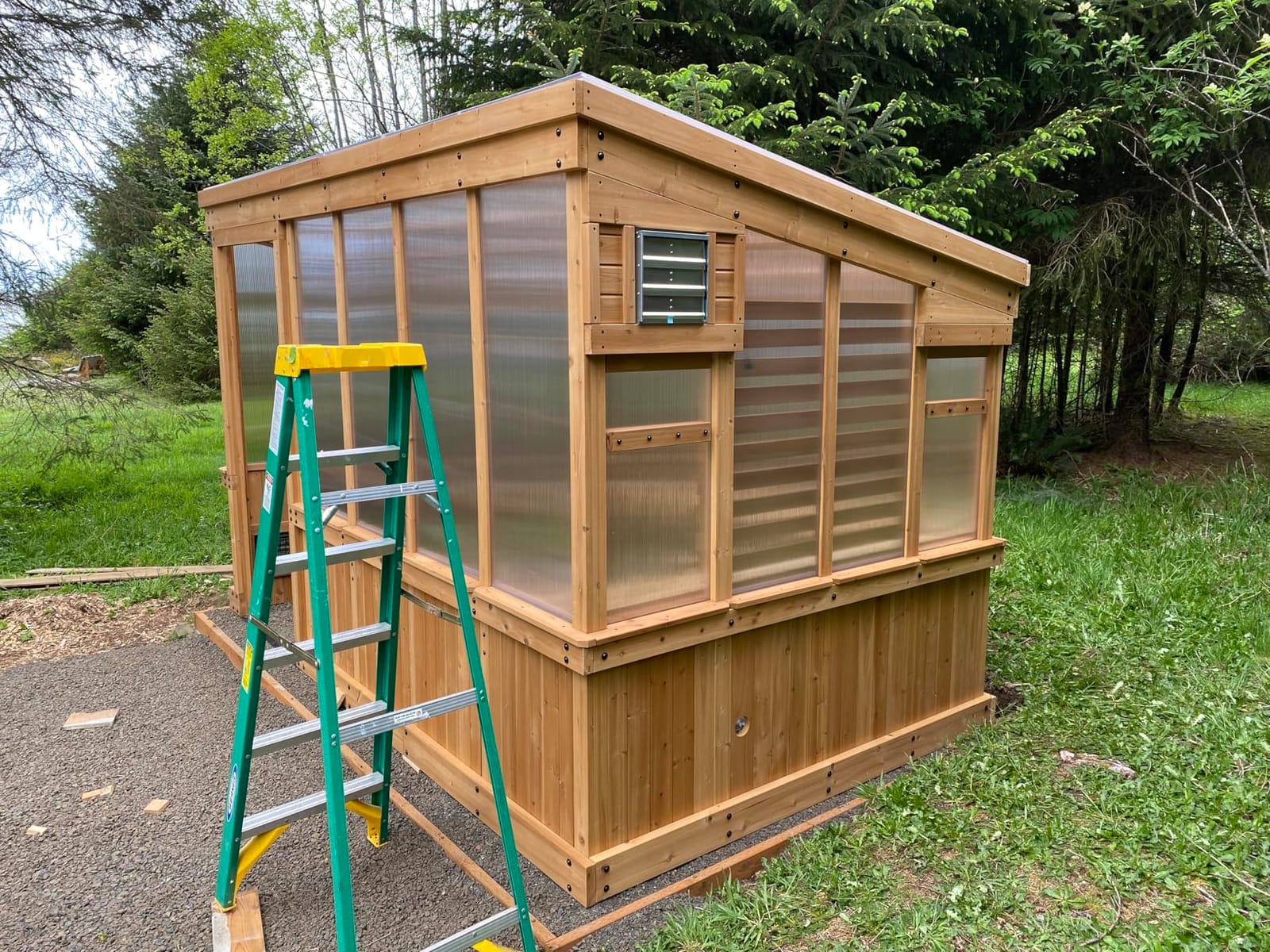 Backyard Discovery Willow 9' x 6' Cedar Wood and Polycarbonate Walk-in Greenhouse Kit with Exhaust Fan, Windows, Hose Hook-Ups, PowerPort, Staging Shelves for Year-Round Outdoor Gardening customer photo 2