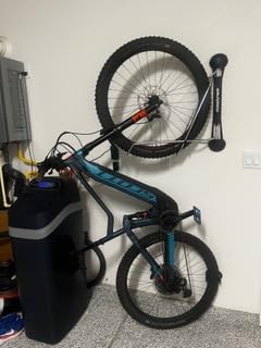 Steadyrack Swivel Bike Wall Mount, Vertical Mountain Bike Rack, Garage | Fits 24 to 29 in wheels and 2.1 to 2.8 in tires. Roll-in, no lift, holds mountain and gravel bikes to 77 lb. customer photo 1