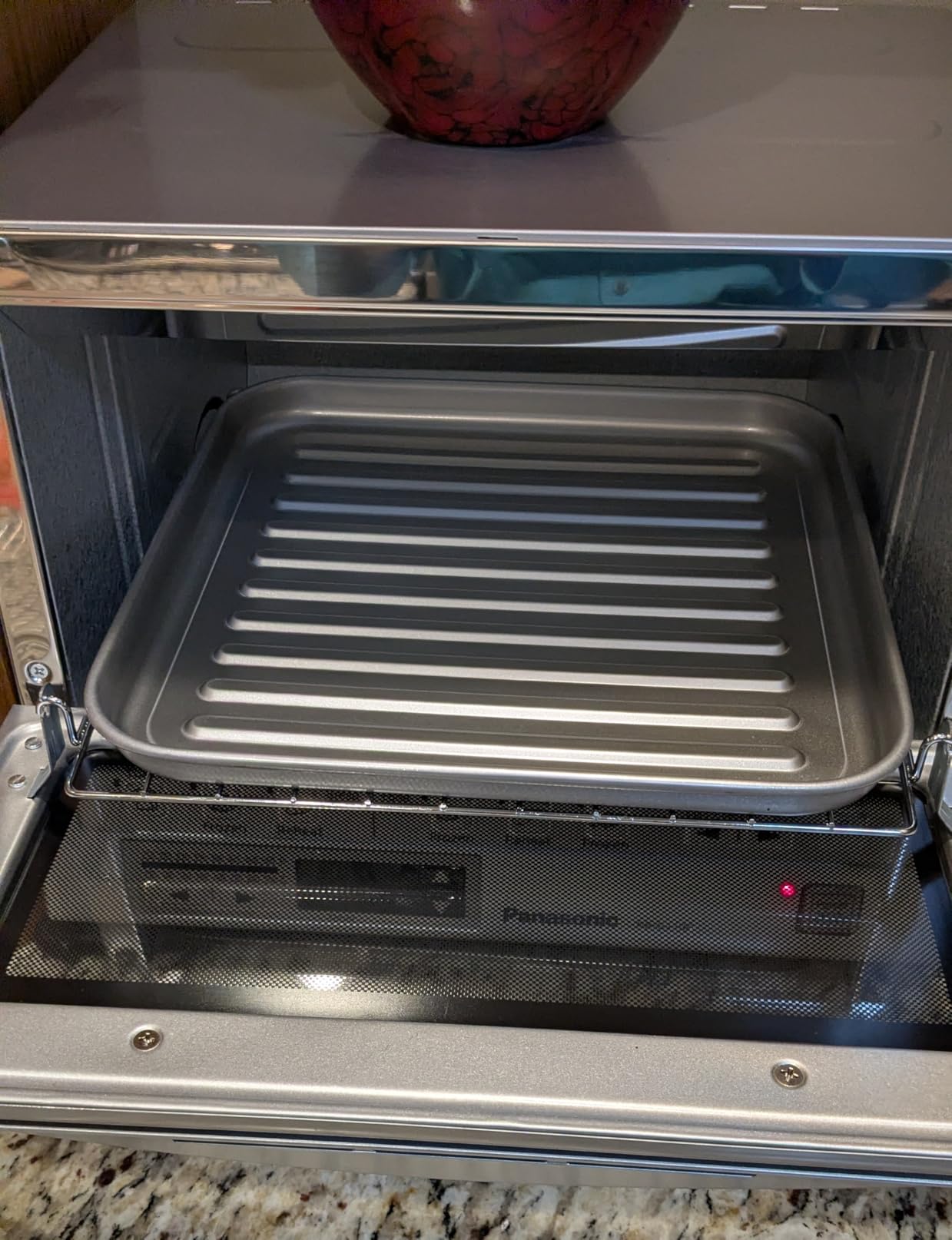 Panasonic FlashXpress Toaster Oven Countertop, 4-Slice Small Toaster Oven Compact Size with Double Infrared Heating, 6 Auto Cook Options and Precise Temperature Control, 1300W - NB-G110P (Silver) customer photo 1