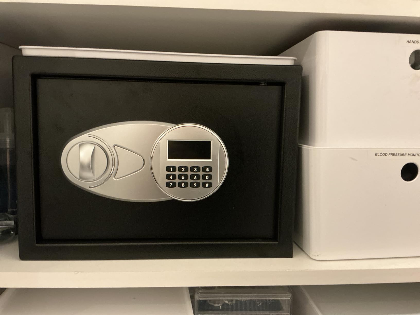 Amazon Basics Steel Security Safe and Lock Box with Digital Keypad, Electronic Lock, Emergency Key Open, Secure Cash, Jewelry, Documents, Black, 0.7 Cubic Feet, 16.9-x-14.6-x-7.1-inches (WxDxH) customer photo 2