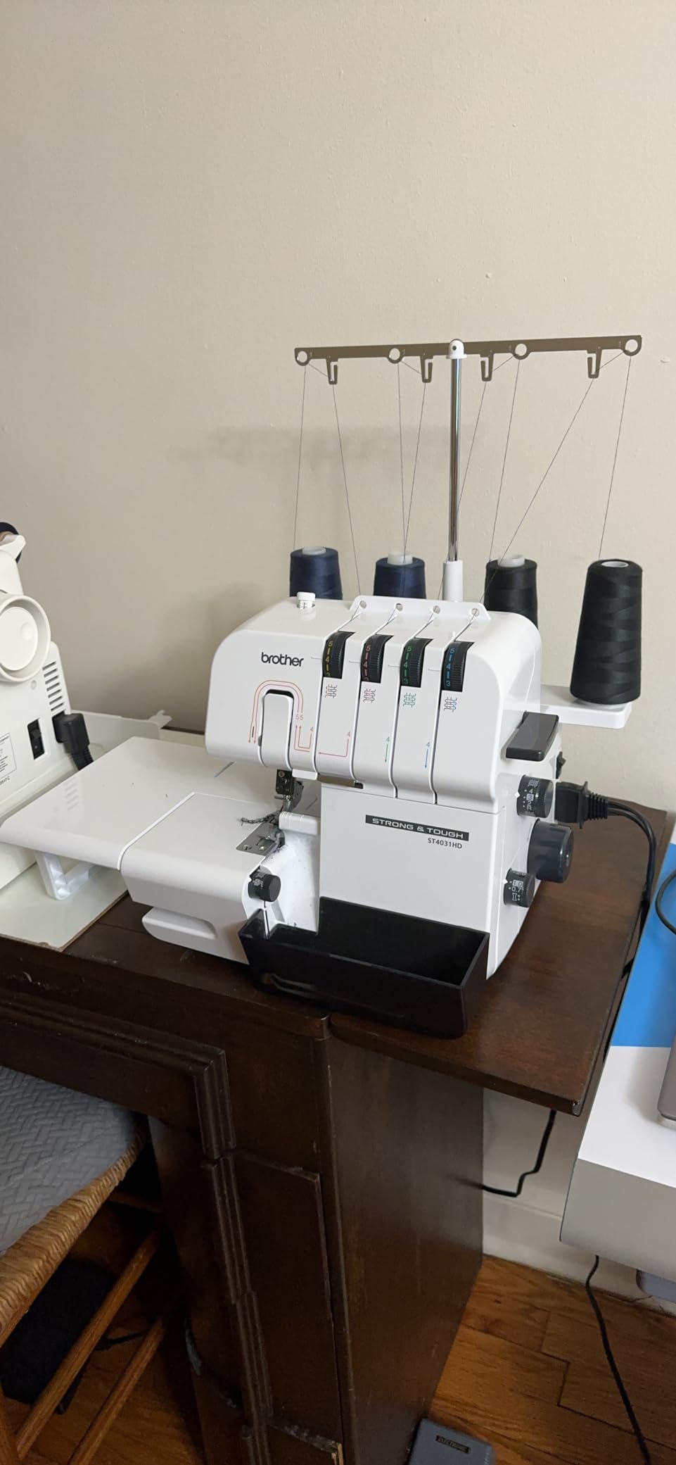 Brother ST4031HD Serger, Strong & Tough Serger, 1,300 Stitches Per Minute, Durable Metal Frame Overlock Machine, Large Extension Table, 3 Included Accessory Feet, 12.99 x 14.37 x 17.01 in., White customer photo 1