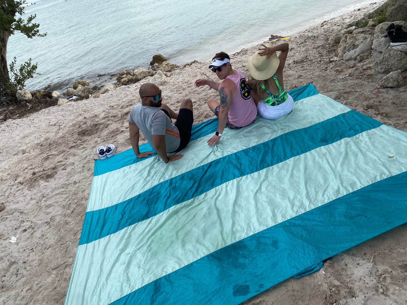 Extra Large Beach Blanket Waterproof Sandproof – XXL Oversized Beach Mat 10ft x 9ft Fits up to 8 Adults - Quick Dry Travel Blanket with 4 Stakes, Corner Pockets, Strap and Attached Bag customer photo 1