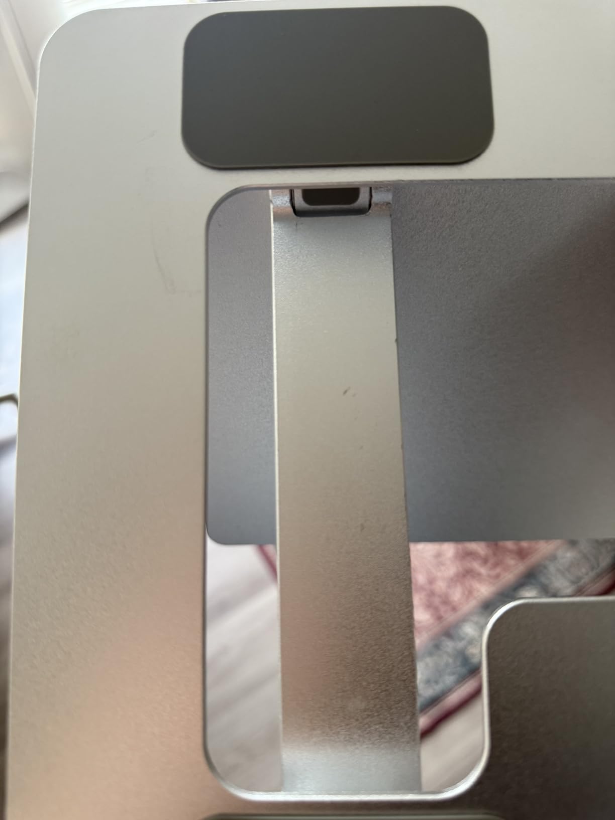 Amazon Basics Sturdy and Portable Ergonomic Laptop Stand for Desk, Height Adjustable Riser with Ventilated Cooling, Foldable, Fits all Laptops up to 15.6 Inch, Silver customer photo 2