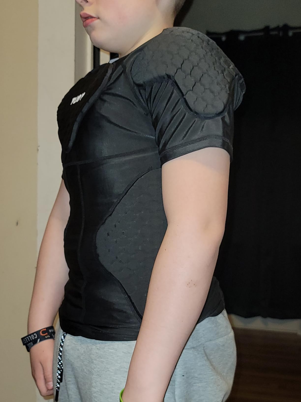 TUOY New Football Rib Chest Protector Shirt Padded Compression Shirts 6 Pads Adult Sizes Dark Black customer photo 1
