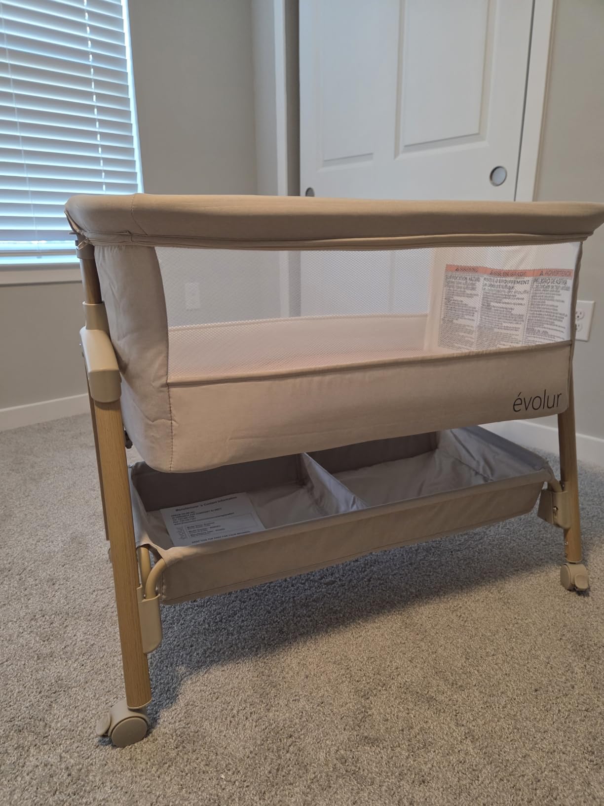 Evolur Lullaby Portable Bassinet with Wheels, Adjustable Bedside Sleeper, Breathable Mesh Sides, Large Storage Basket, Easy Fold, and Travel Bag Included, Perfect for Newborns & Infants - Biege customer photo 1