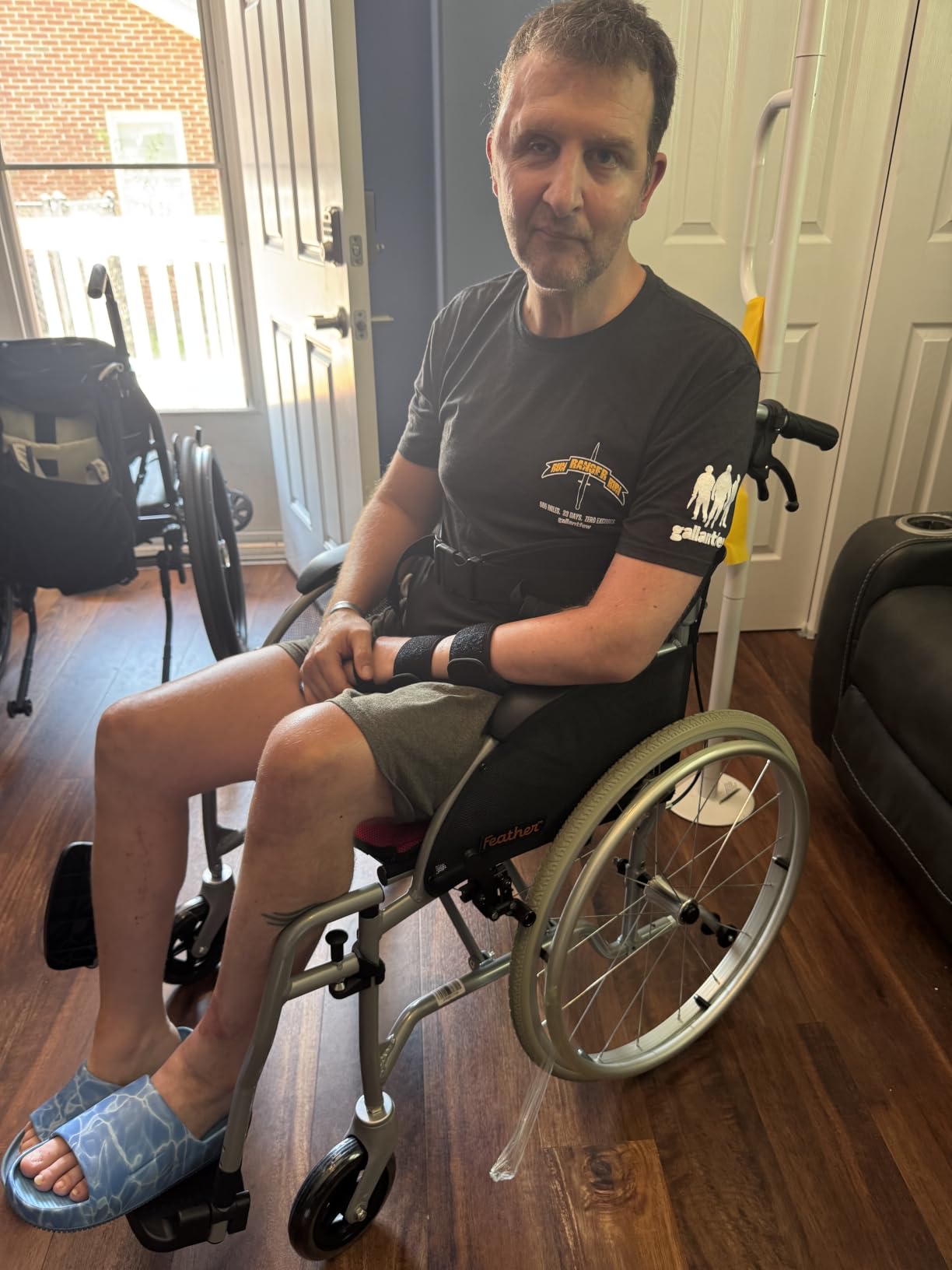 FeatherMobility - Black Lightweight HD Wheelchair - 16 lbs Frame, Extra Wide 24